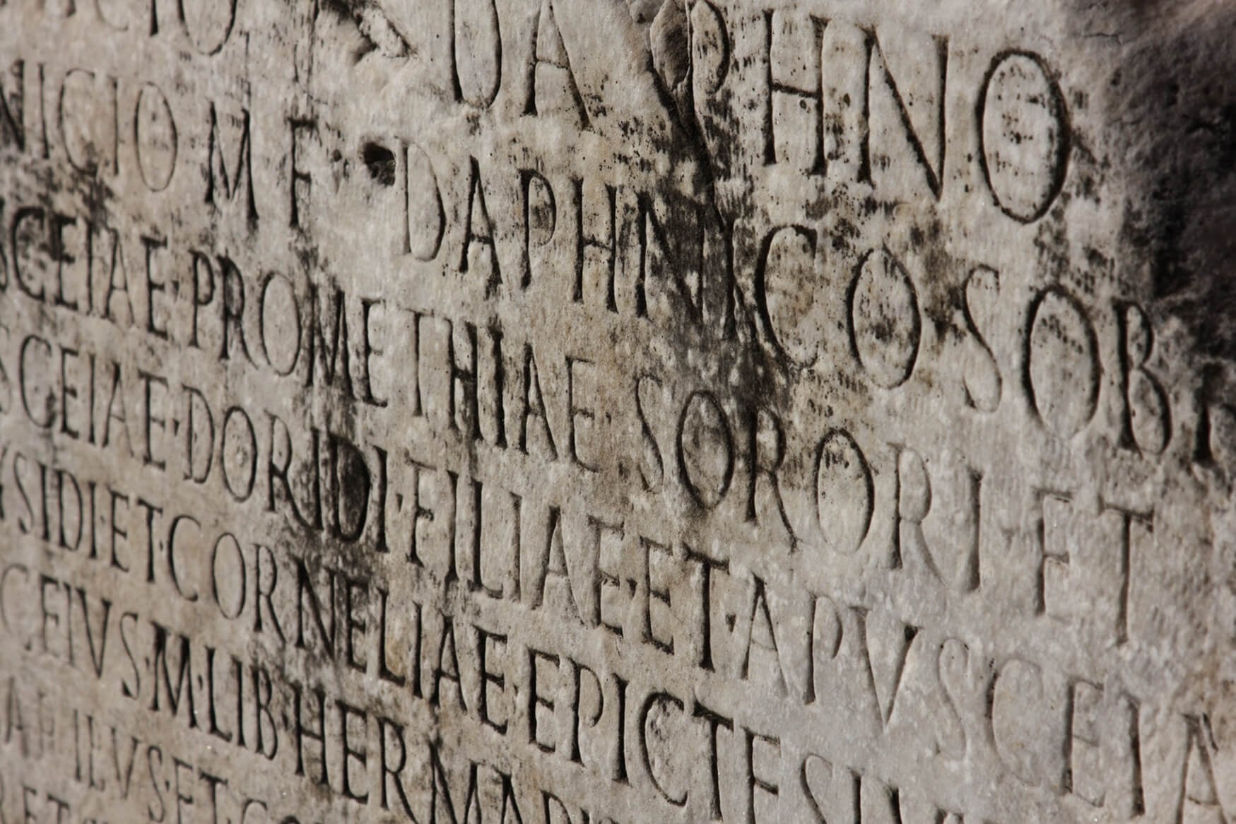 Old Latin catholic inscription on a stone.